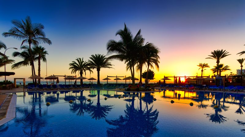 puesta de sol piscina dorado beach hotel